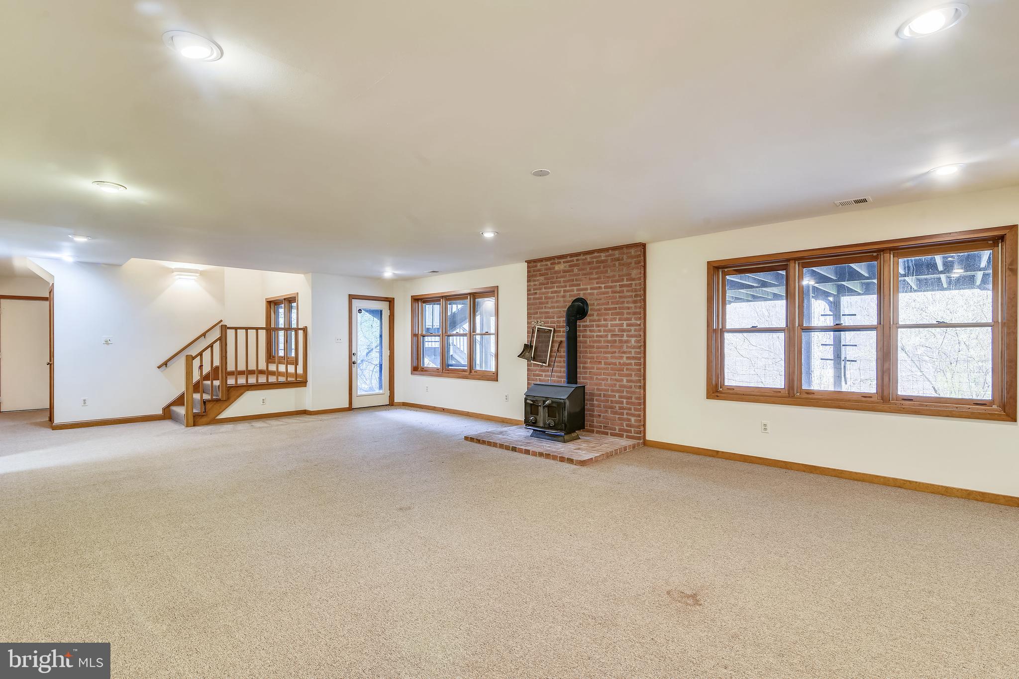 41635 Stumptown Road Leesburg, VA 20176 - Photo 39 of 60 Rec room with cozy wood stove