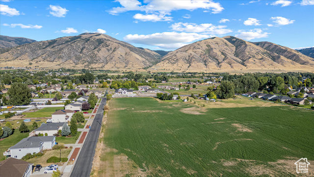 294 West 3400 South, Unit 9 Logan, UT 84321 - Photo 2 of 24 Mountain view with nearby suburban area
