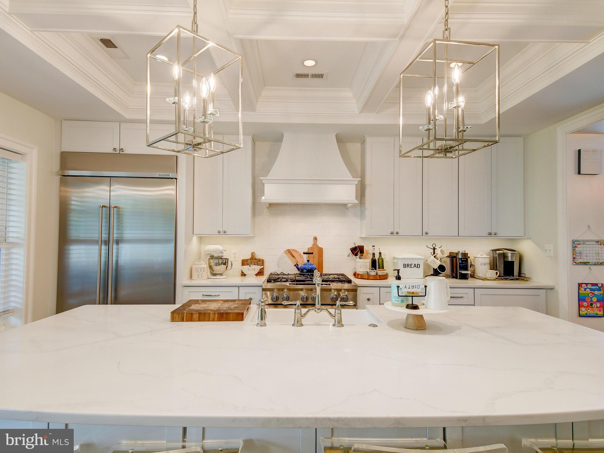 6621 Loch Hill Road Baltimore, MD 21239 - Photo 16 of 45 Pendant lights over Kitchen island