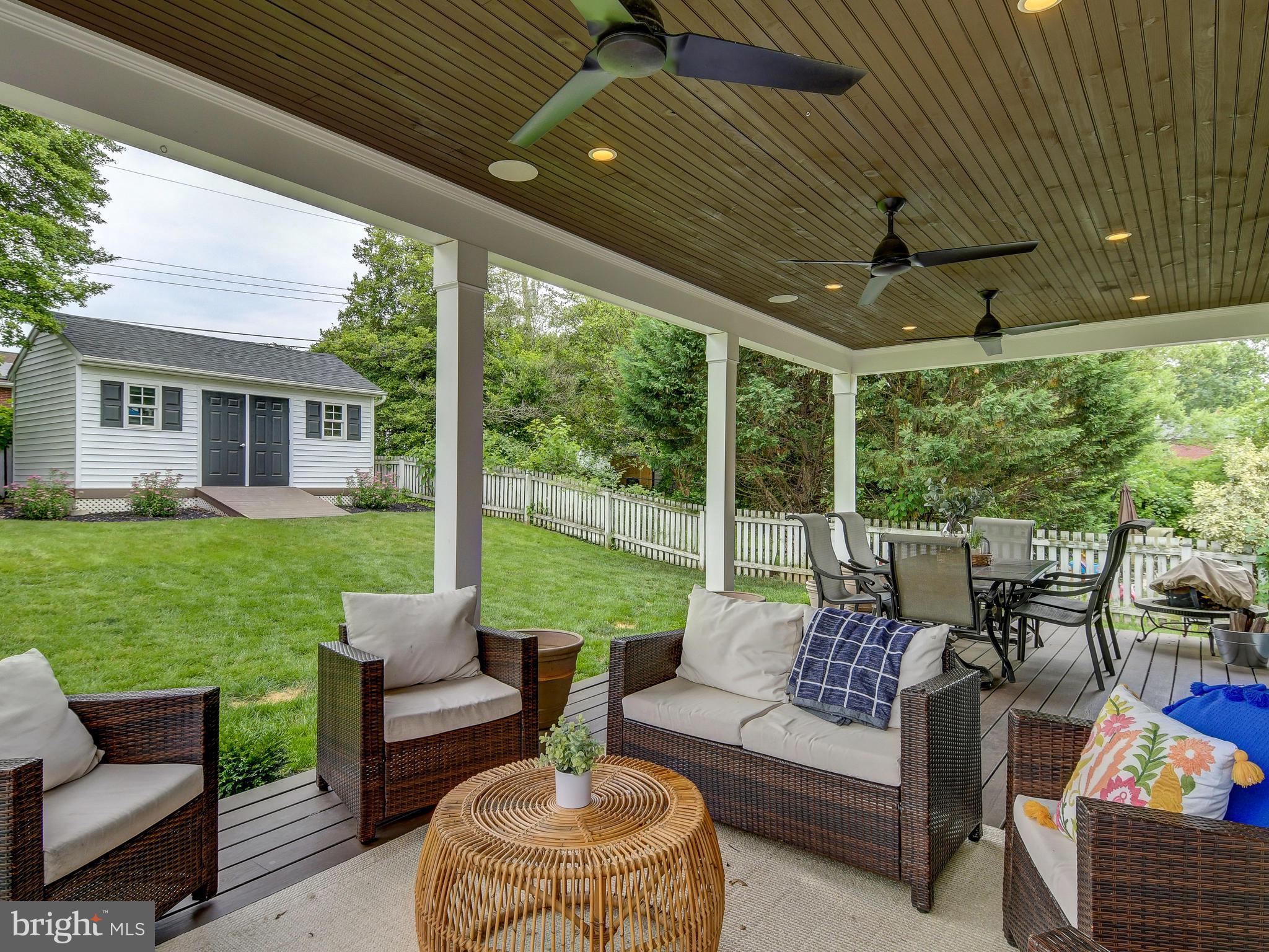 6621 Loch Hill Road Baltimore, MD 21239 - Photo 43 of 45 Rear deck with 3 outdoor ceiling fans