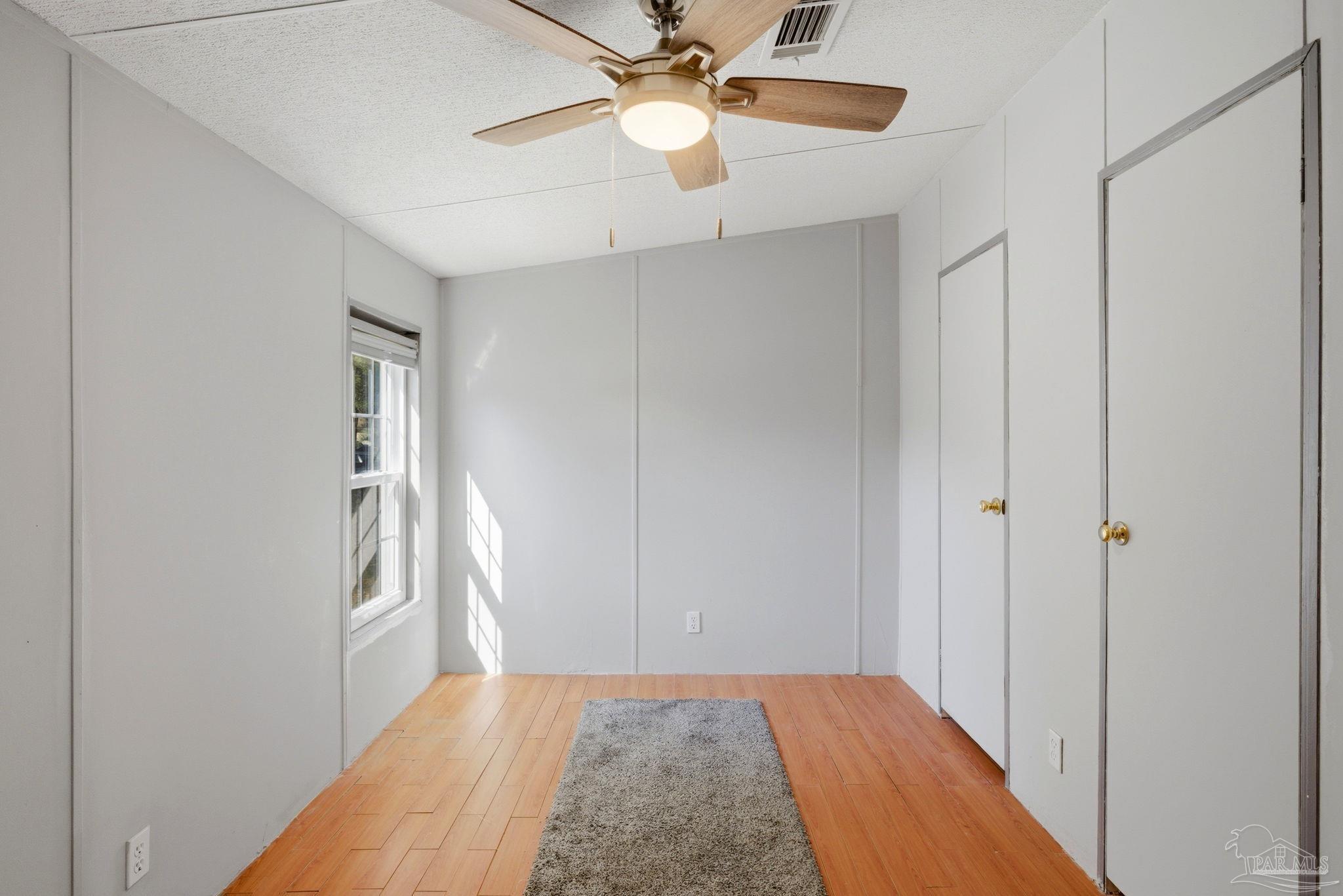 8962 Bluebell Street Milton, FL 32583 - Photo 22 of 35 a view of hallway with front door