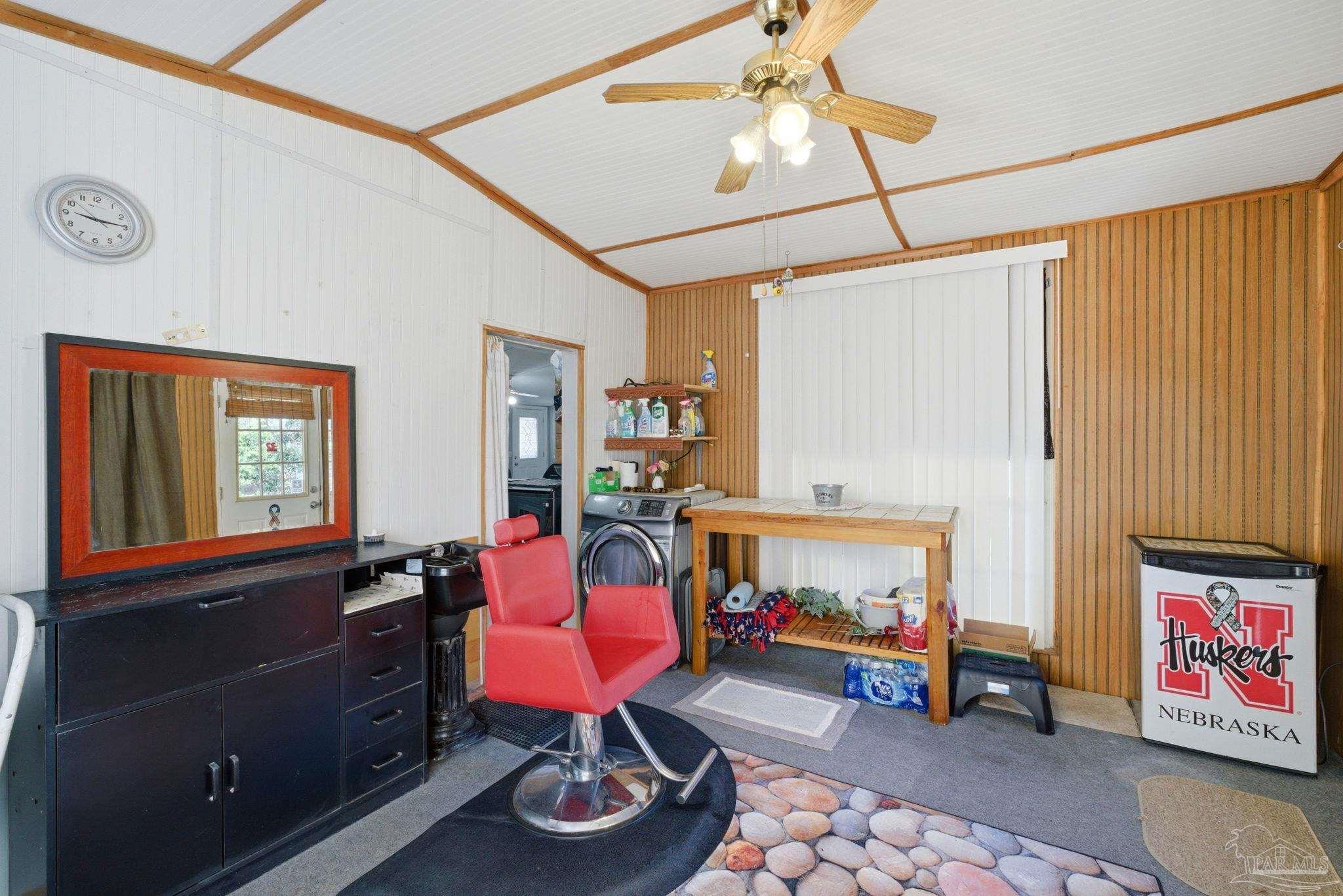 8962 Bluebell Street Milton, FL 32583 - Photo 29 of 35 a room with furniture and a window
