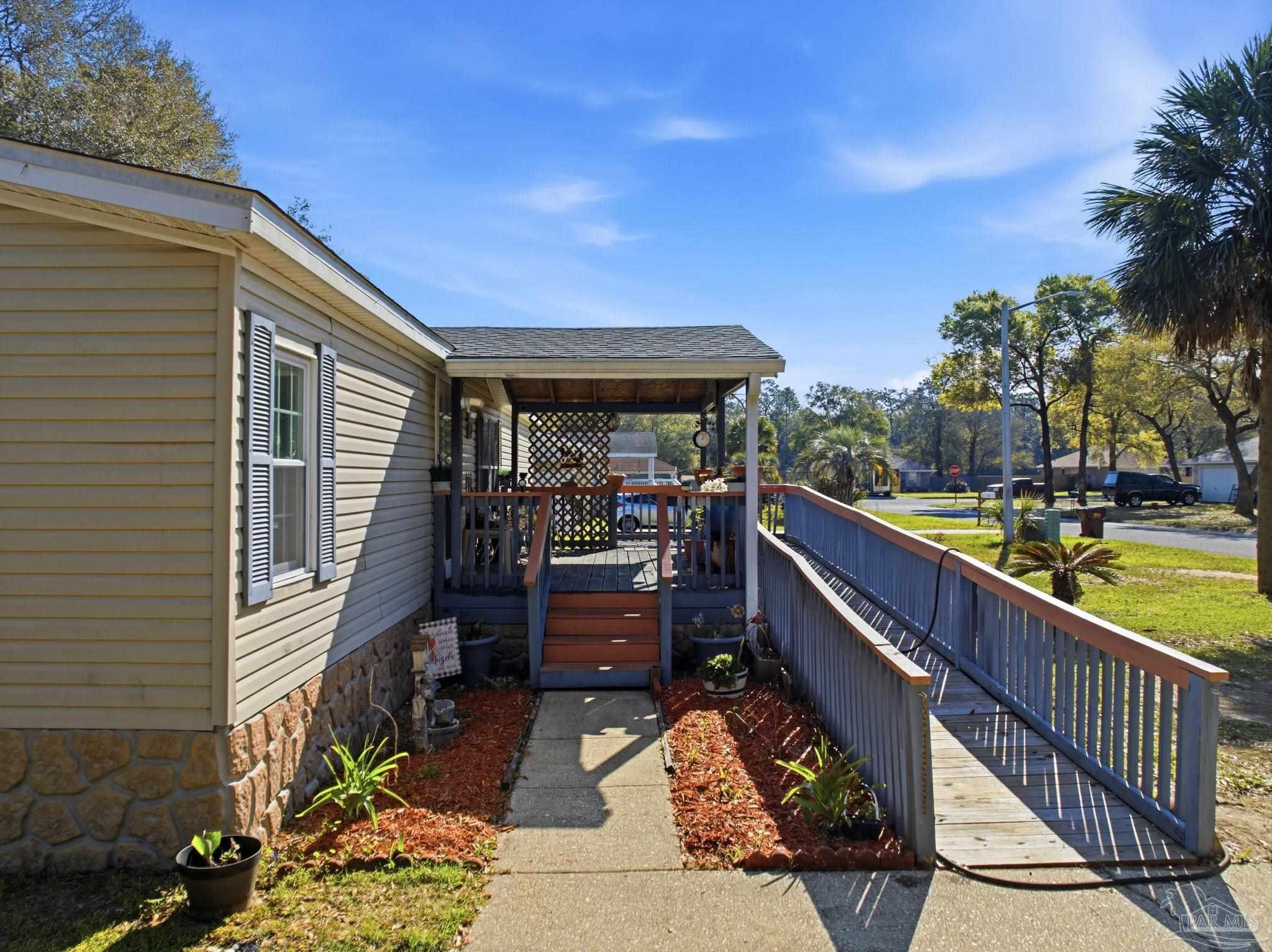 8962 Bluebell Street Milton, FL 32583 - Photo 5 of 35 a view of balcony with furniture