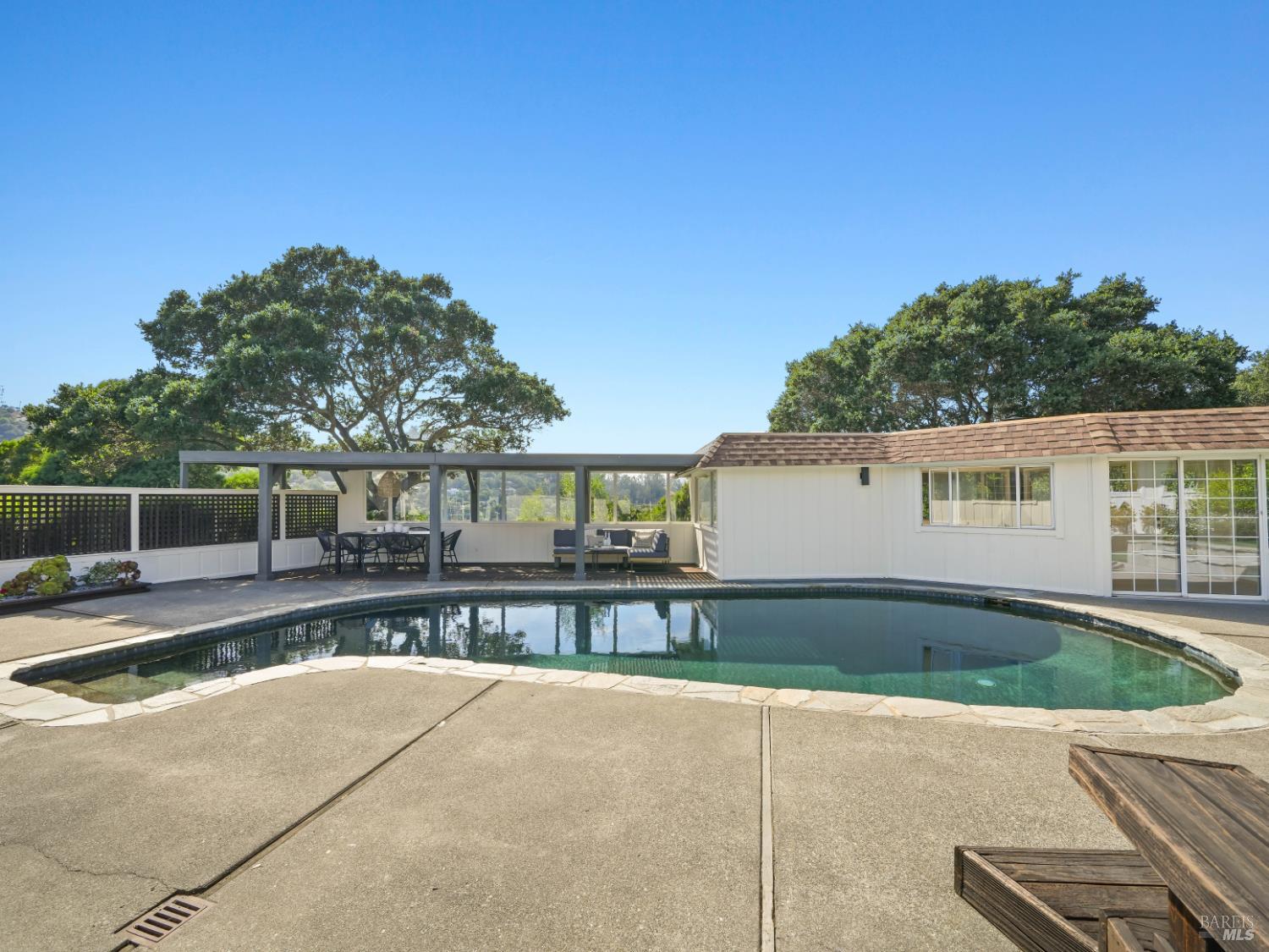 148 Dominican Drive San Rafael, CA 94901 - Photo 44 of 60 a view of a swimming pool with a patio