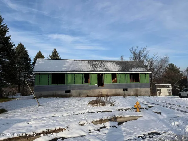 front view of house with a yard
