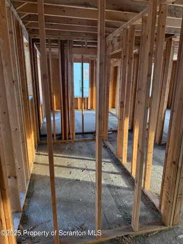 a view of entryway with front door