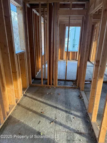 a view of outdoor space with wooden wall