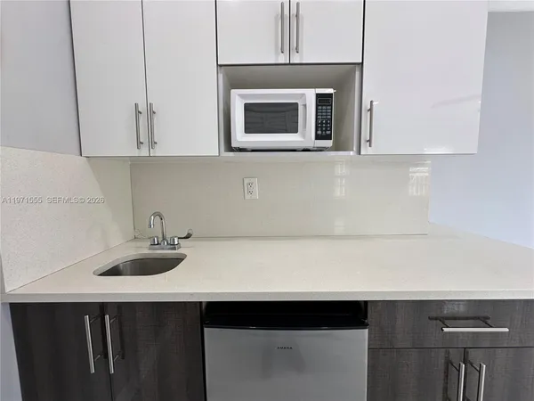 a living room with a fireplace