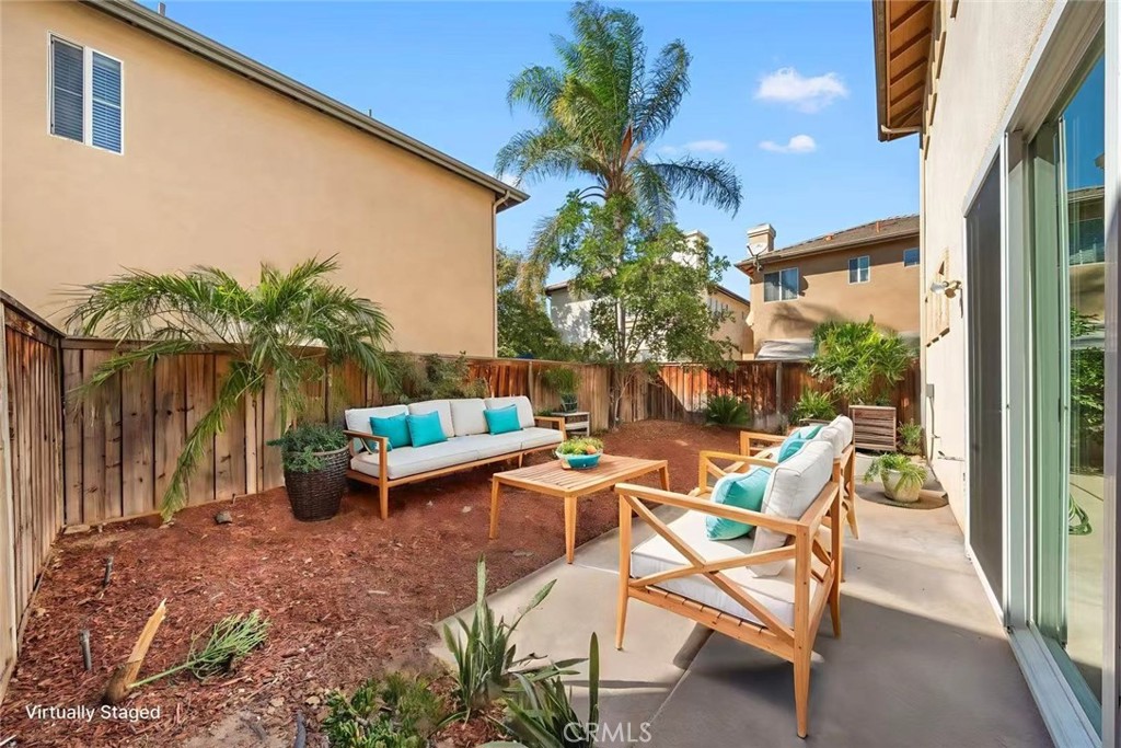 4539 Rivergate Court Riverside, CA 92505 - Photo 21 of 29 a backyard of a house with table and chairs