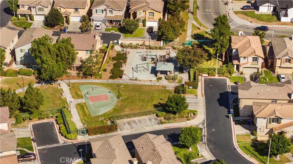 4539 Rivergate Court Riverside, CA 92505 - Photo 24 of 29 an aerial view of a residential apartment building with a yard