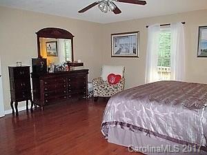 1610 Center Road Chester, SC 29706 - Photo 17 of 24 a bedroom with a bed and a dresser