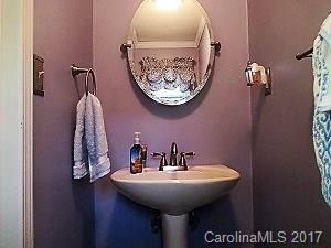 1610 Center Road Chester, SC 29706 - Photo 9 of 24 a bathroom with a sink and mirror