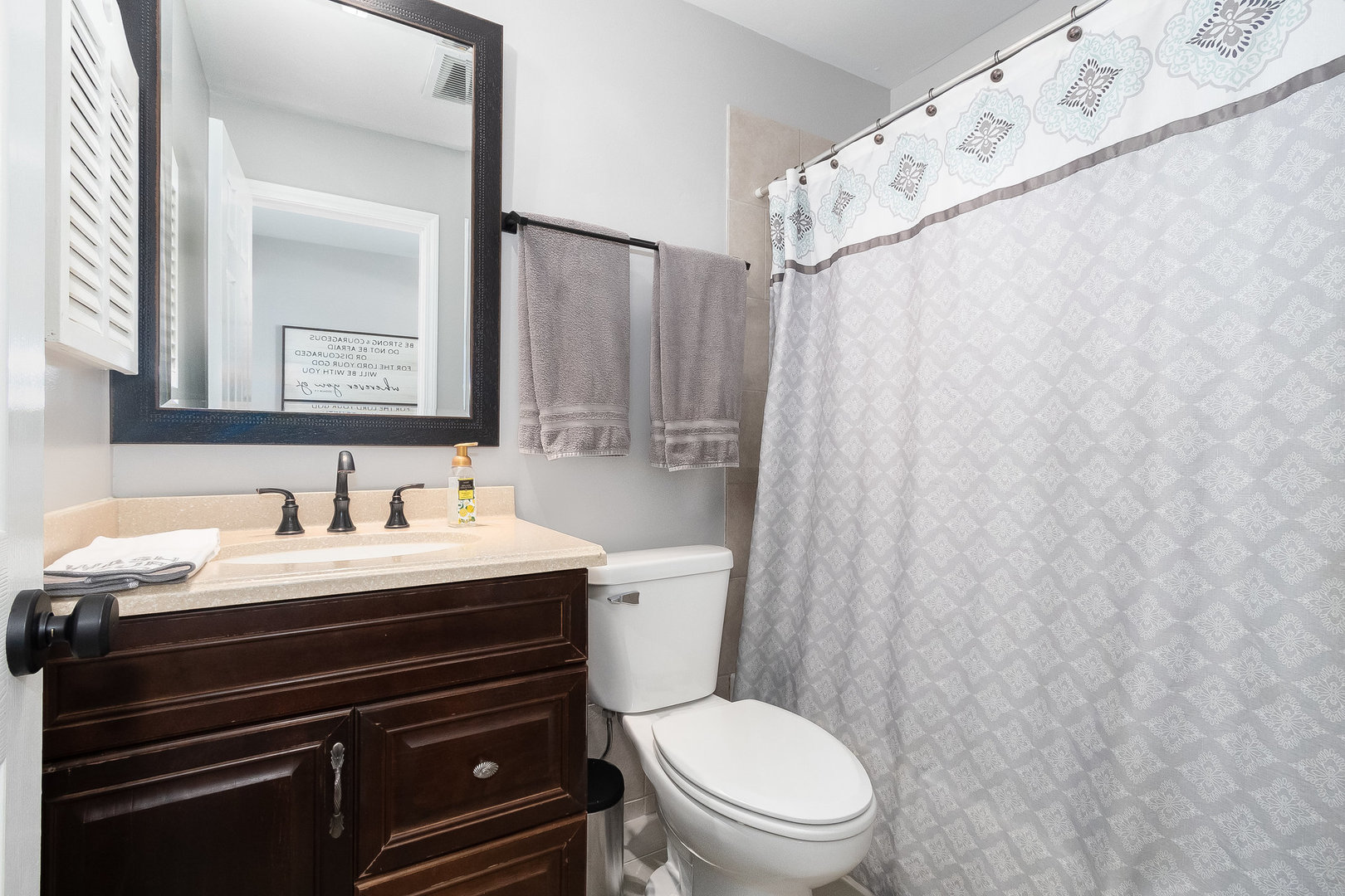 25 North Bereman Road Montgomery, IL 60538 - Photo 13 of 28 a bathroom with a granite countertop sink toilet and a mirror
