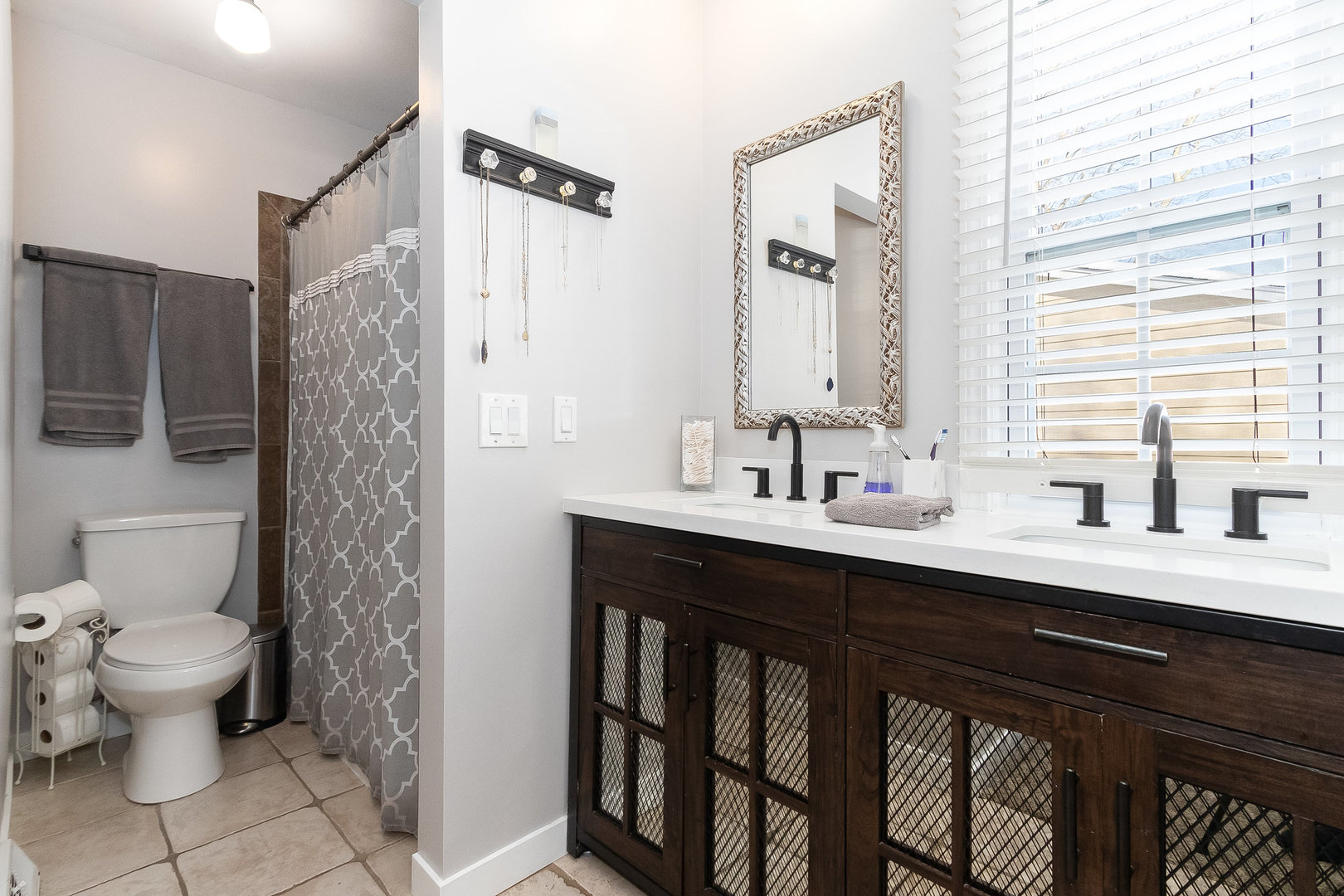 25 North Bereman Road Montgomery, IL 60538 - Photo 14 of 28 a bathroom with a double vanity sink mirror and toilet
