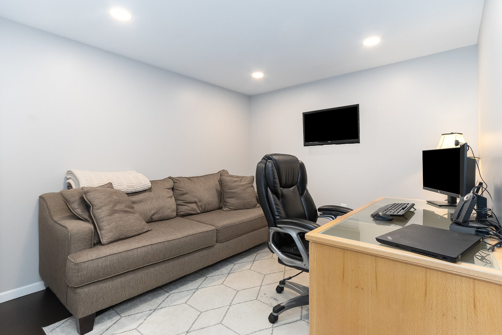 25 North Bereman Road Montgomery, IL 60538 - Photo 19 of 28 a living room with furniture and a flat screen tv