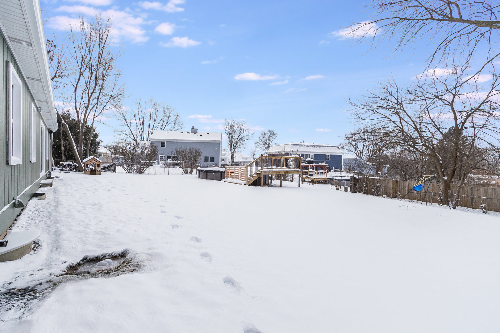25 North Bereman Road Montgomery, IL 60538 - Photo 24 of 28 a view of a house with snow on the road