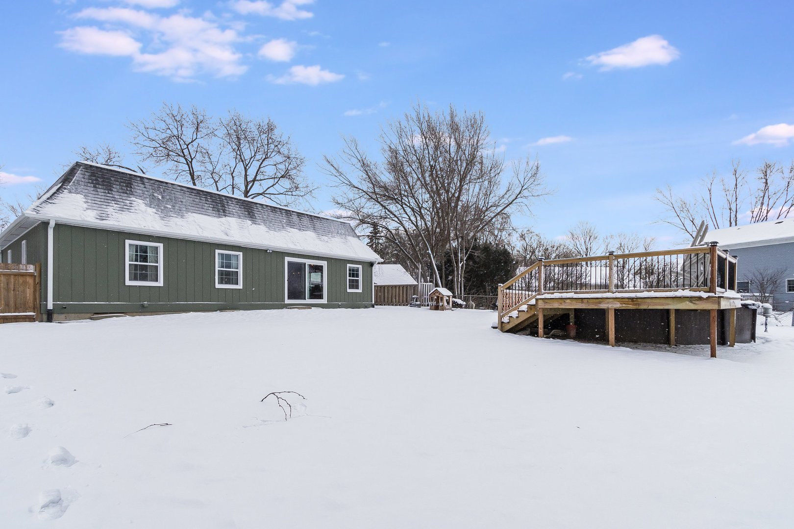 25 North Bereman Road Montgomery, IL 60538 - Photo 25 of 28 a view of a house with a yard covered in snow