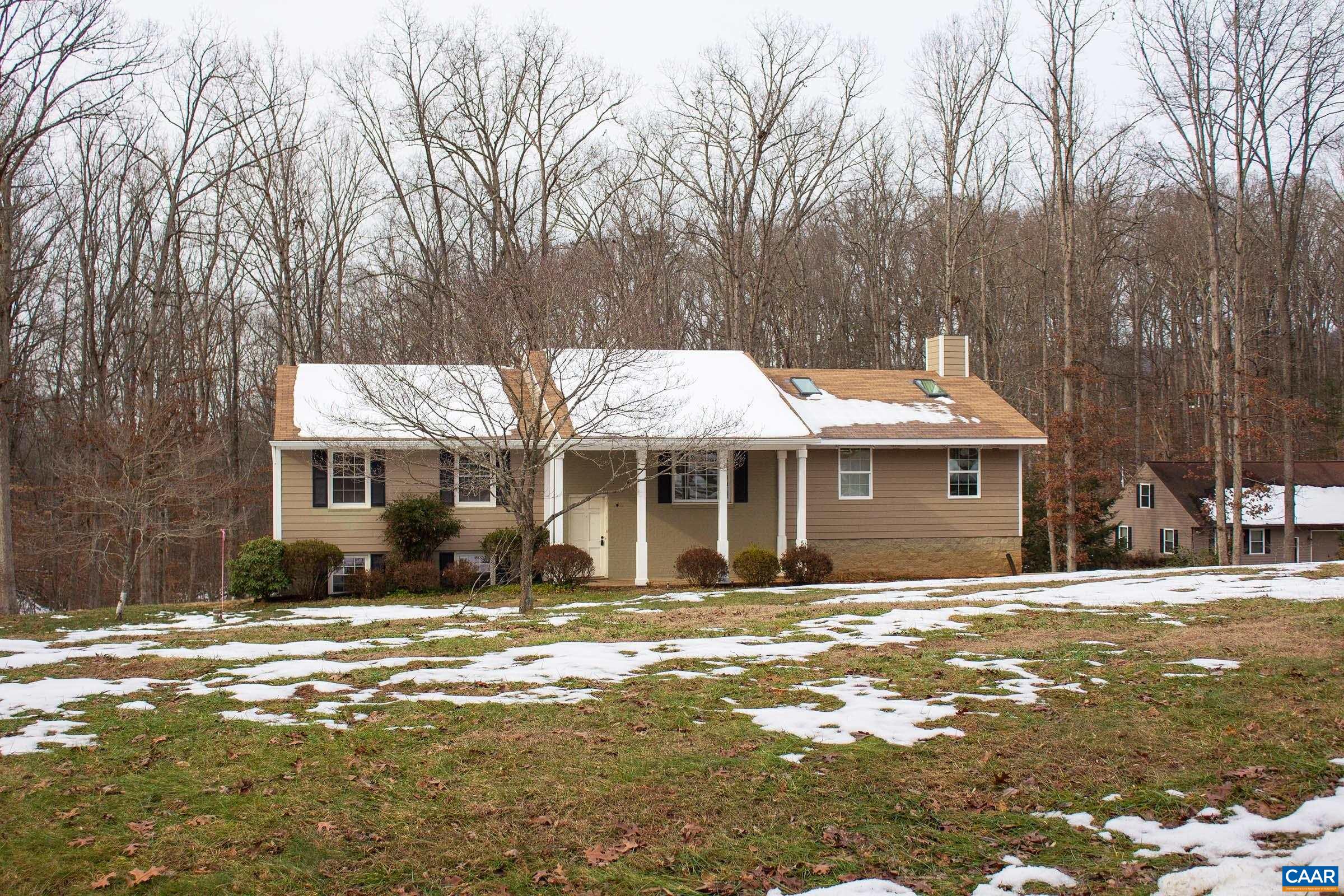 1010 Shadwell Road Keswick, VA 22947 - Photo 3 of 43 a front view of a house with a yard