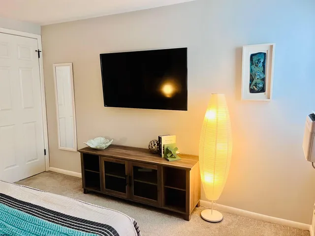 a bathroom with a double vanity sink and mirror
