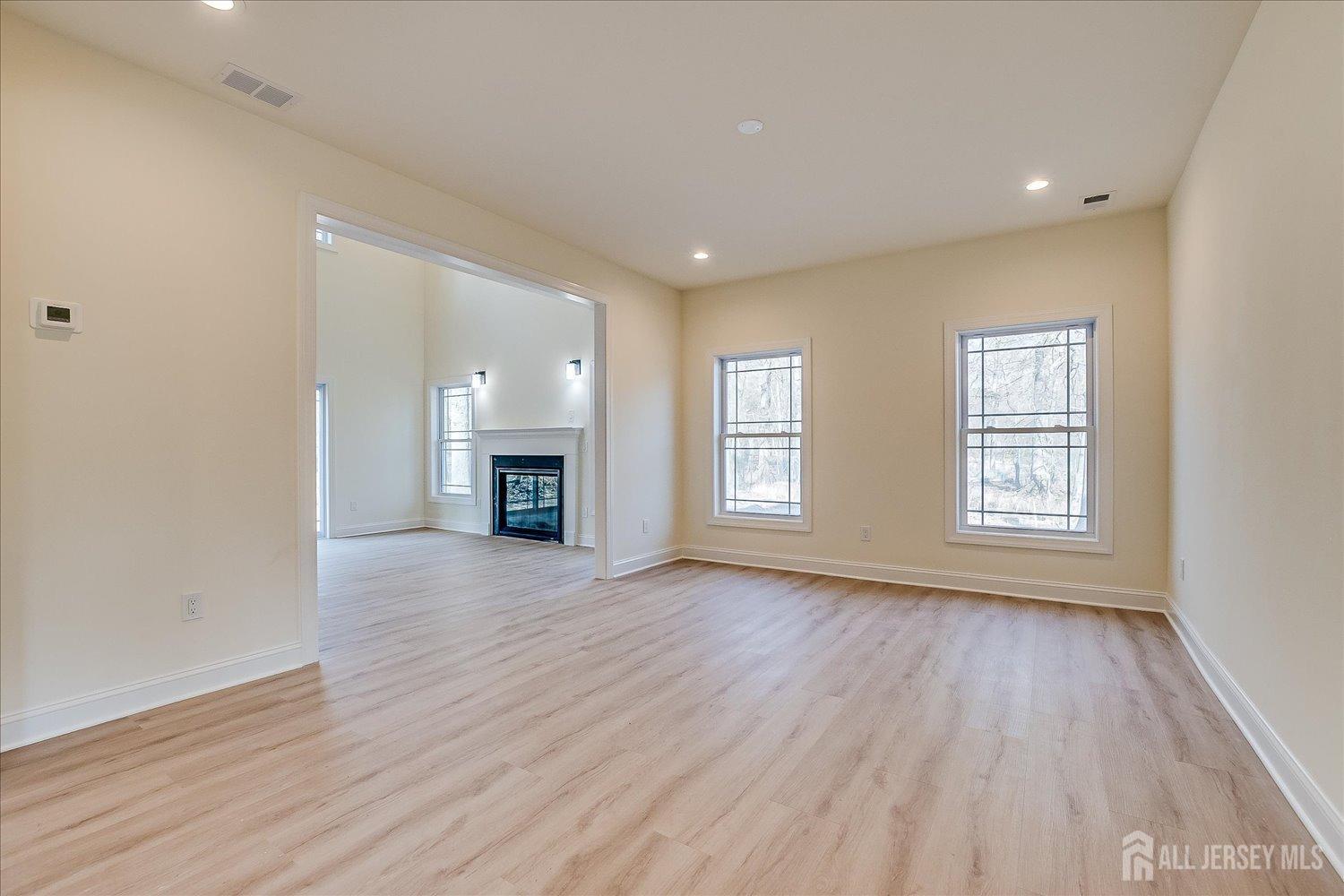 90 Hancock Road Piscataway, NJ 08854 - Photo 11 of 50 a view of a room that has wooden floor and a window