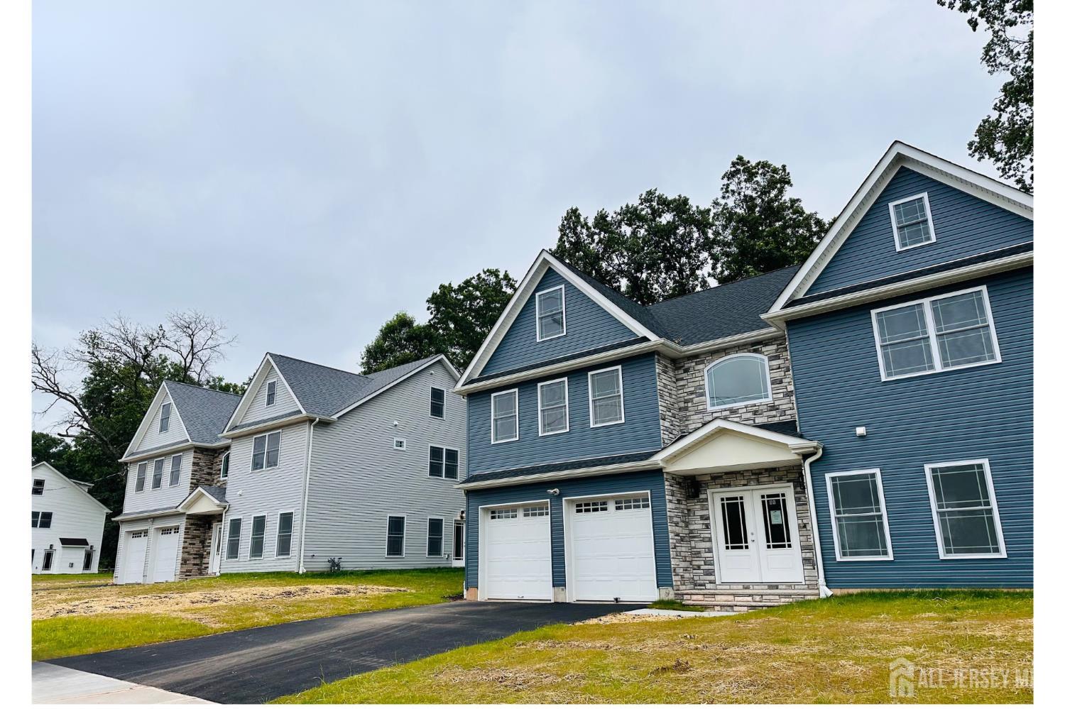 90 Hancock Road Piscataway, NJ 08854 - Photo 2 of 50 a front view of a house with swimming pool