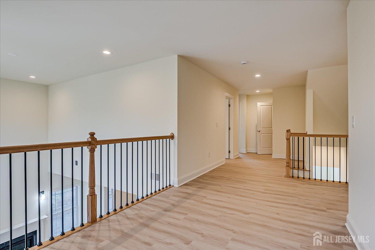 90 Hancock Road Piscataway, NJ 08854 - Photo 29 of 50 a view of a hallway with wooden floor