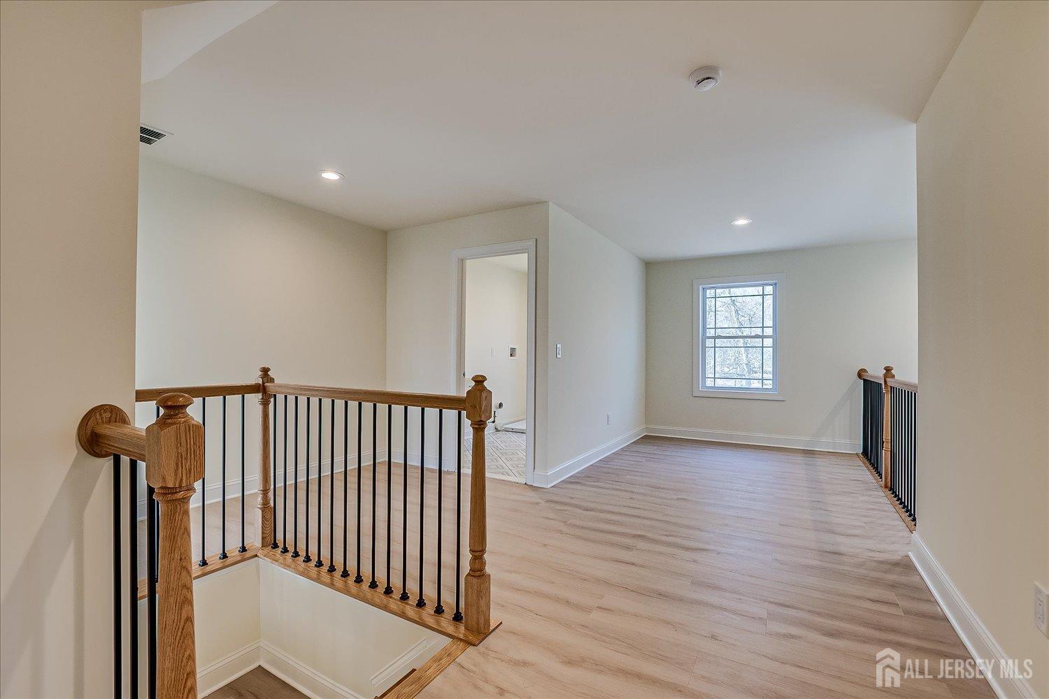 90 Hancock Road Piscataway, NJ 08854 - Photo 30 of 50 a view of a hallway with windows and stairs