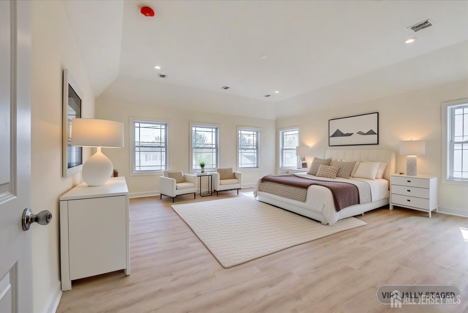 90 Hancock Road Piscataway, NJ 08854 - Photo 31 of 50 a spacious bedroom with a large bed and windows