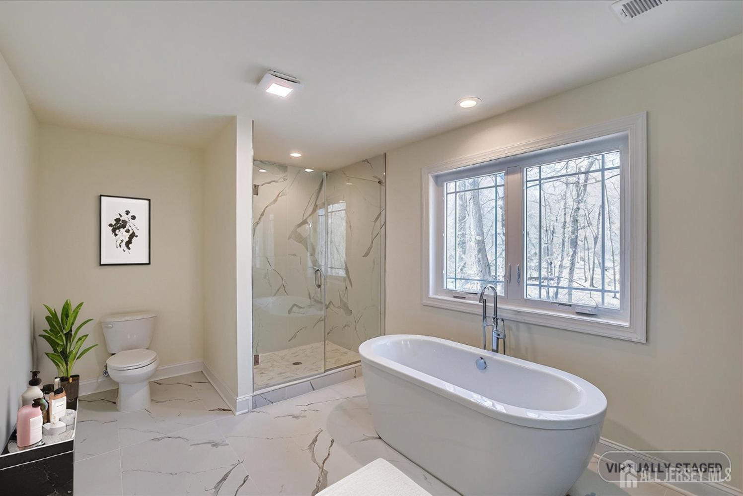 90 Hancock Road Piscataway, NJ 08854 - Photo 37 of 50 a spacious bathroom with a bathtub sink and toilet