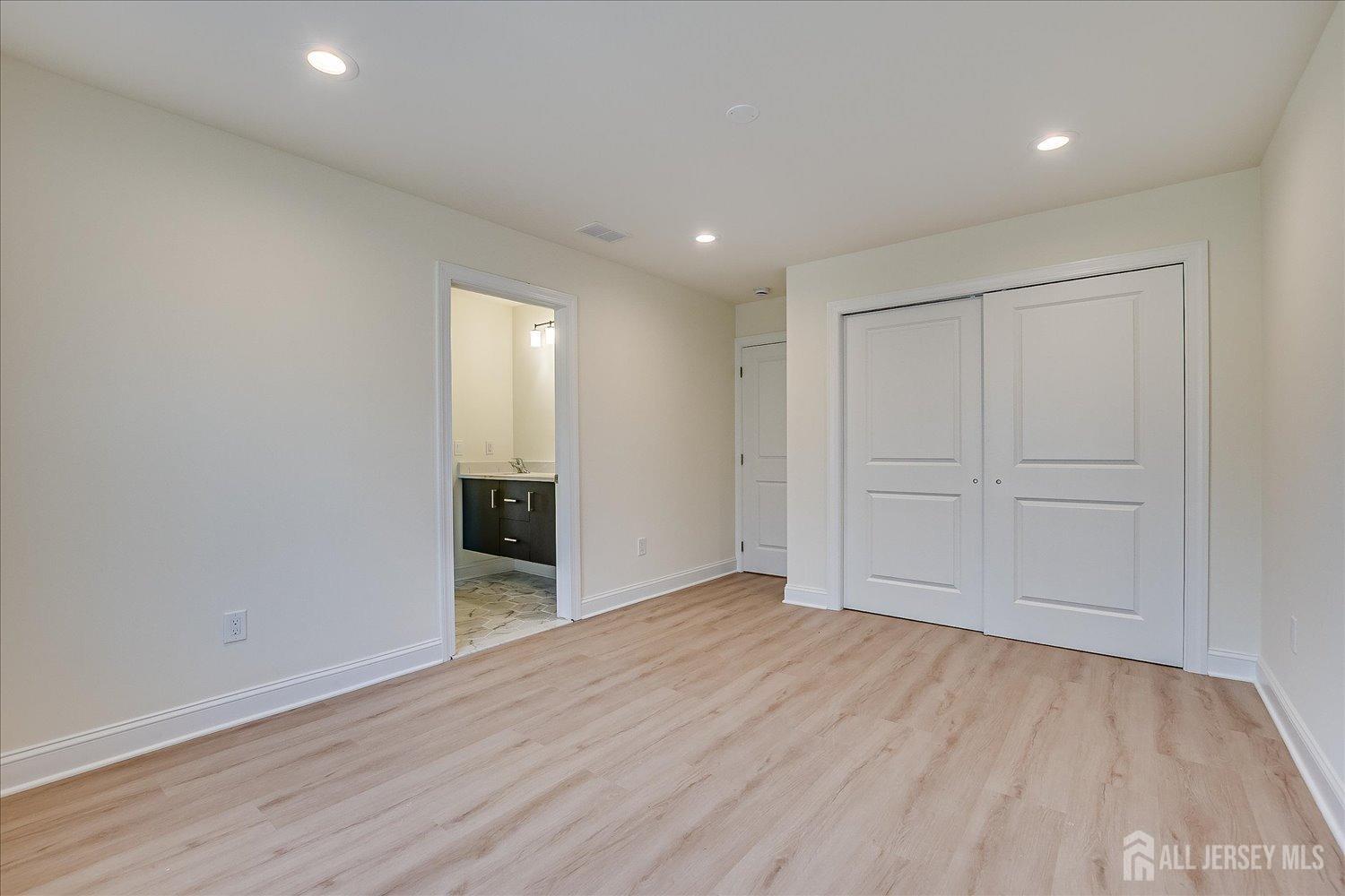 90 Hancock Road Piscataway, NJ 08854 - Photo 39 of 50 a view of empty room with wooden floor and entryway
