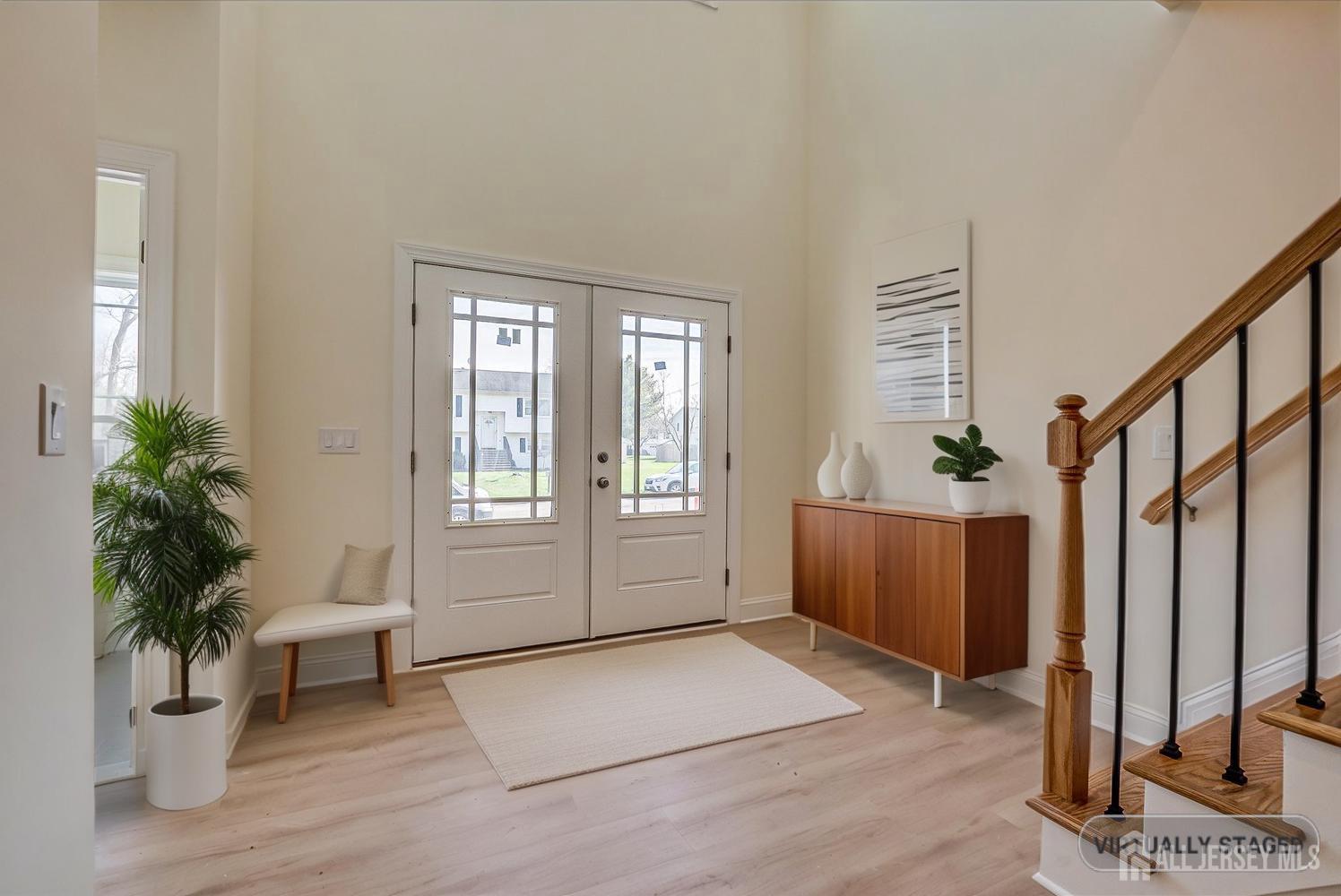 90 Hancock Road Piscataway, NJ 08854 - Photo 4 of 50 a view of an entryway with wooden floor and a potted plant