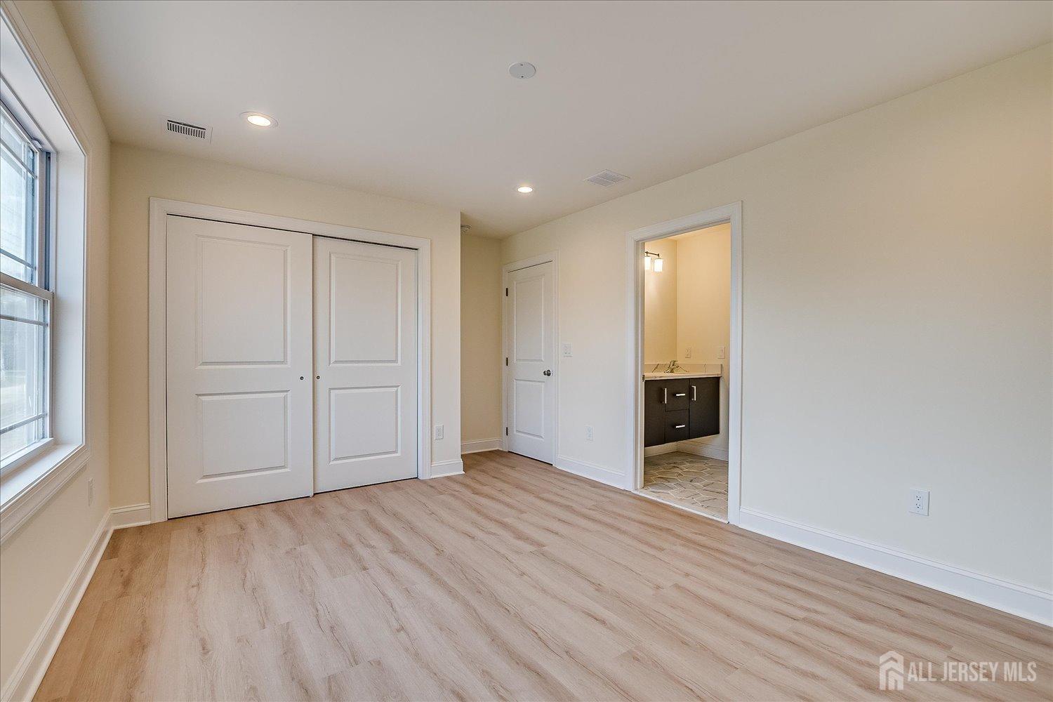 90 Hancock Road Piscataway, NJ 08854 - Photo 43 of 50 wooden floor in an empty room with a window