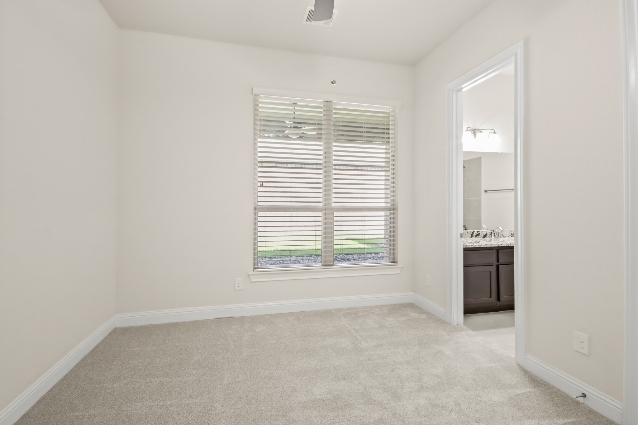 8931 Leaning Hollow Lane Spring, TX 77379 - Photo 21 of 38 The second bedroom is located in the Main house. The bedroom has an en suite bathroom.