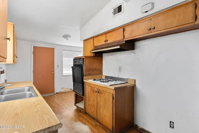 a utility room with washer and dryer