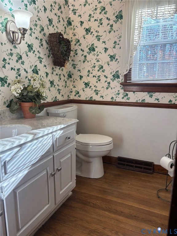 12801 Foxstone Road Midlothian, VA 23113 - Photo 8 of 21 a view of a livingroom with toilet and a sink