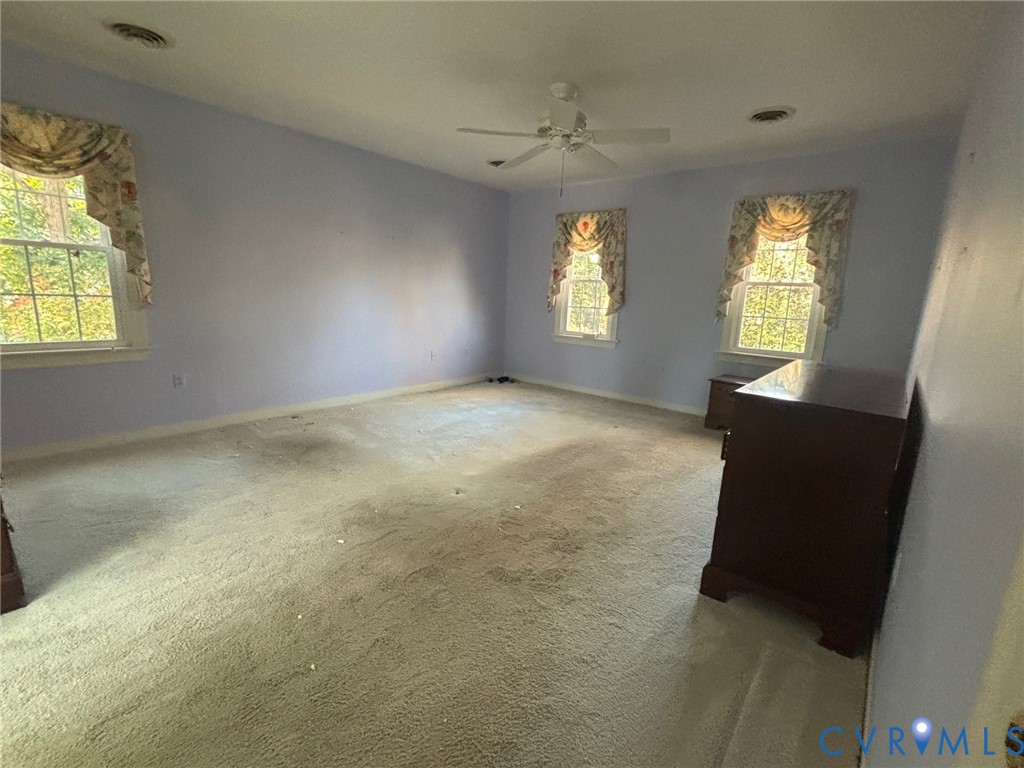 12801 Foxstone Road Midlothian, VA 23113 - Photo 10 of 21 a view of an empty room with a window