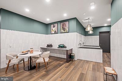1911 Walnut Street, Unit 4102 Philadelphia, PA 19103 - Photo 20 of 25 a kitchen with a table and chairs