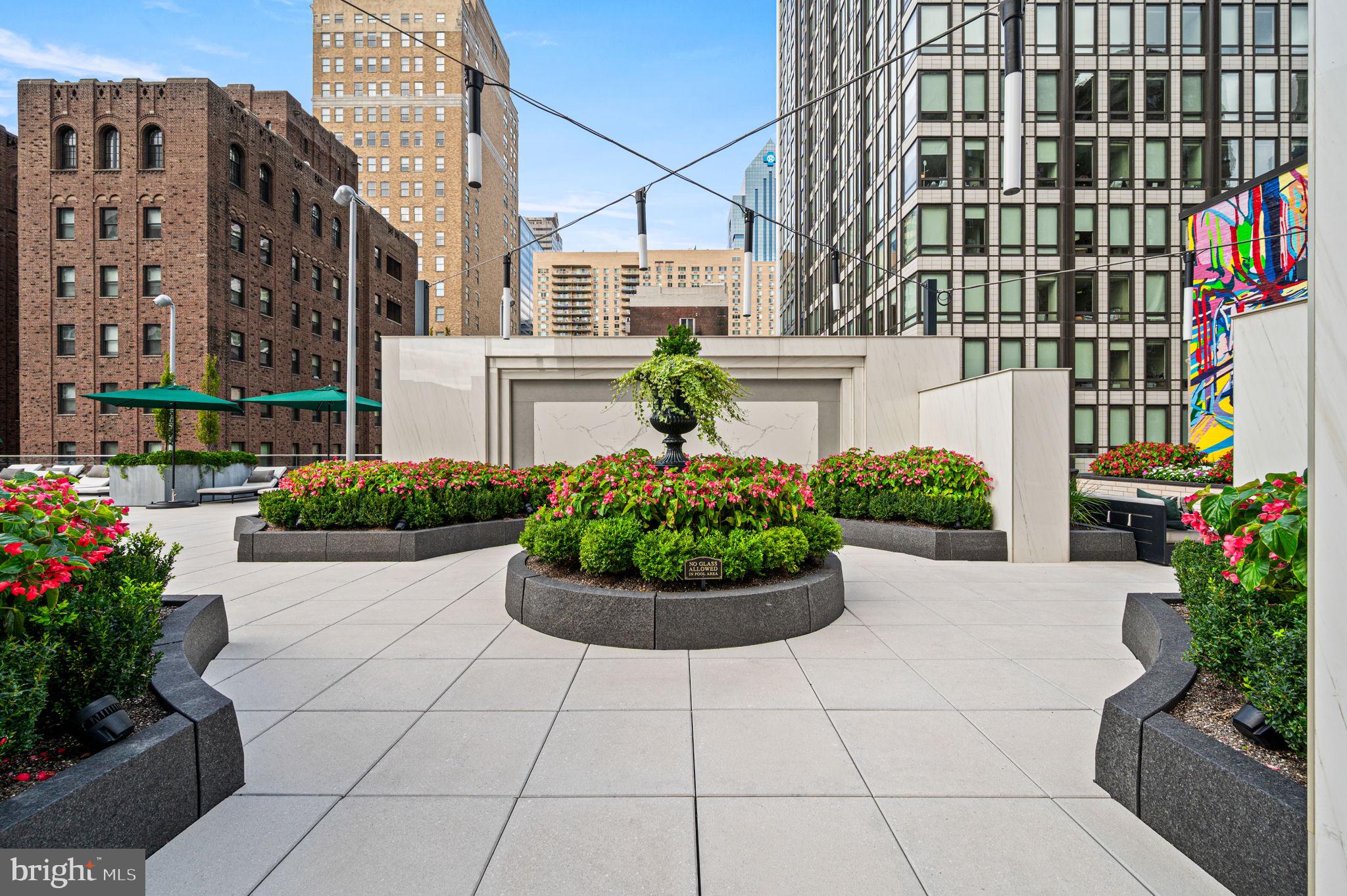 1911 Walnut Street, Unit 4102 Philadelphia, PA 19103 - Photo 21 of 25 a view of a garden with potted plants