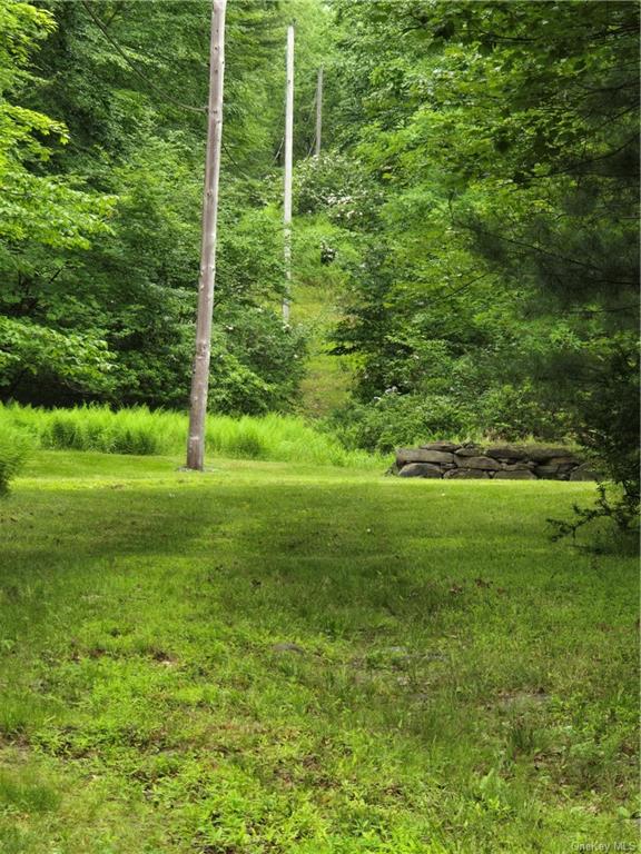 Otens Road Ellenville, NY 12424 - Photo 15 of 34 electric lines on the property, the stone is a loading ramp for tractor, atv etc.