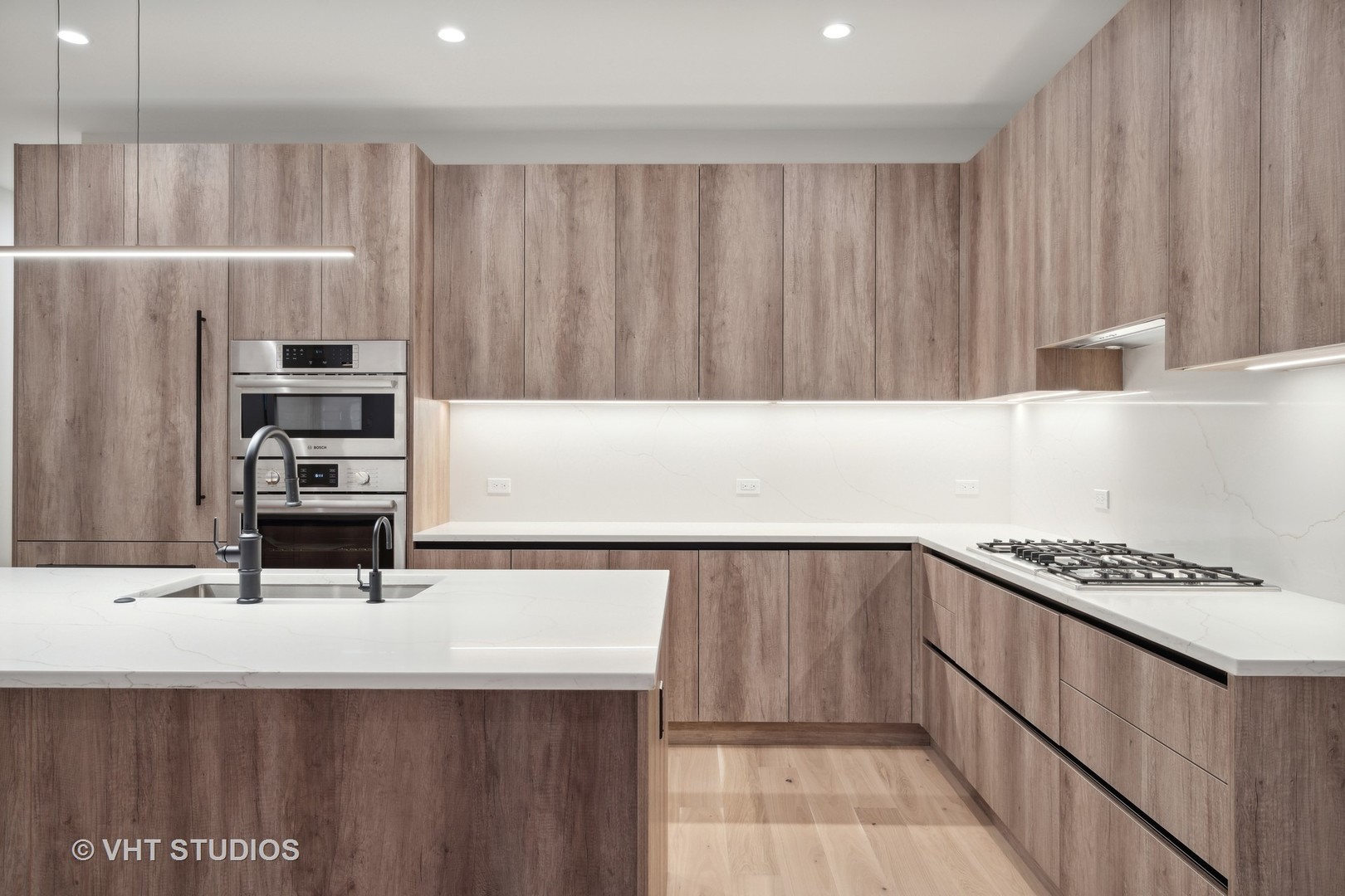 232 South Green Street, Unit 3N Chicago, IL 60607 - Photo 12 of 30 a kitchen with a sink and cabinets