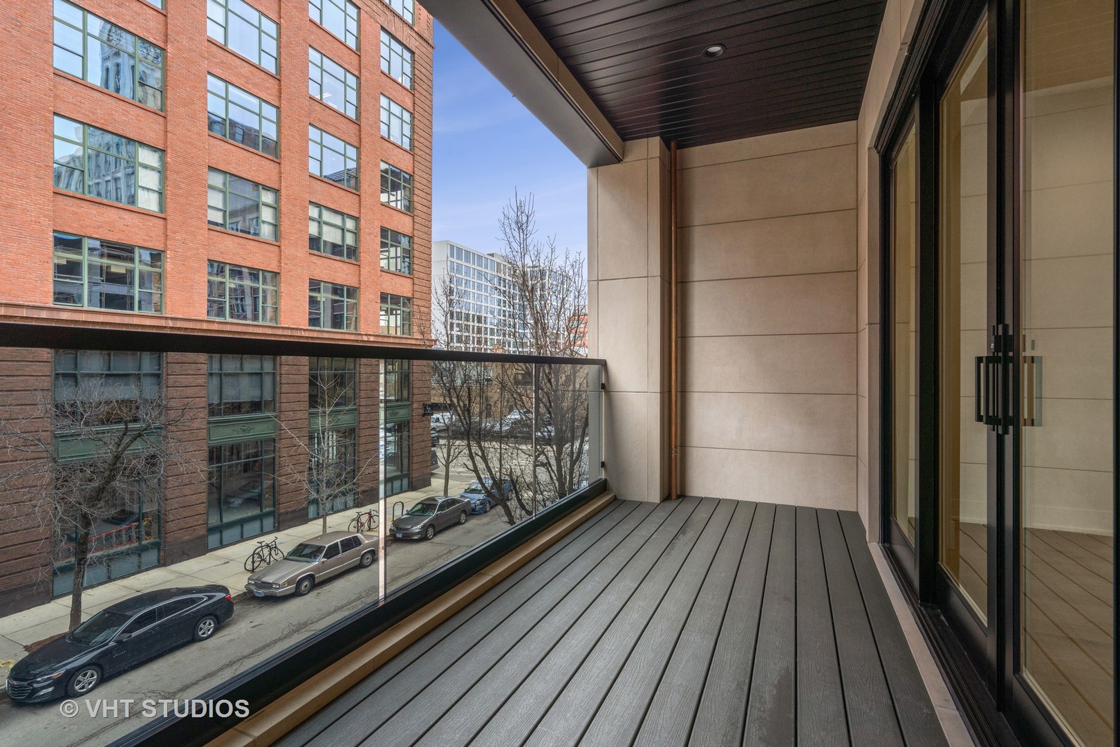232 South Green Street, Unit 3N Chicago, IL 60607 - Photo 30 of 30 a balcony with wooden floor