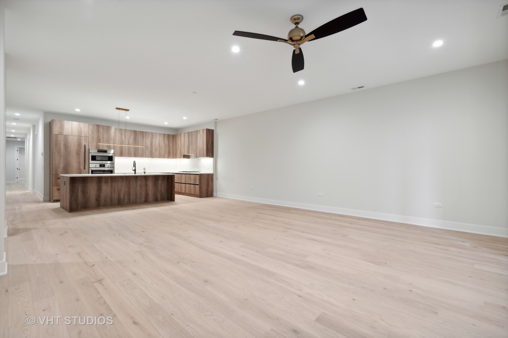 232 South Green Street, Unit 3N Chicago, IL 60607 - Photo 6 of 30 an empty room with wooden cabinet and windows