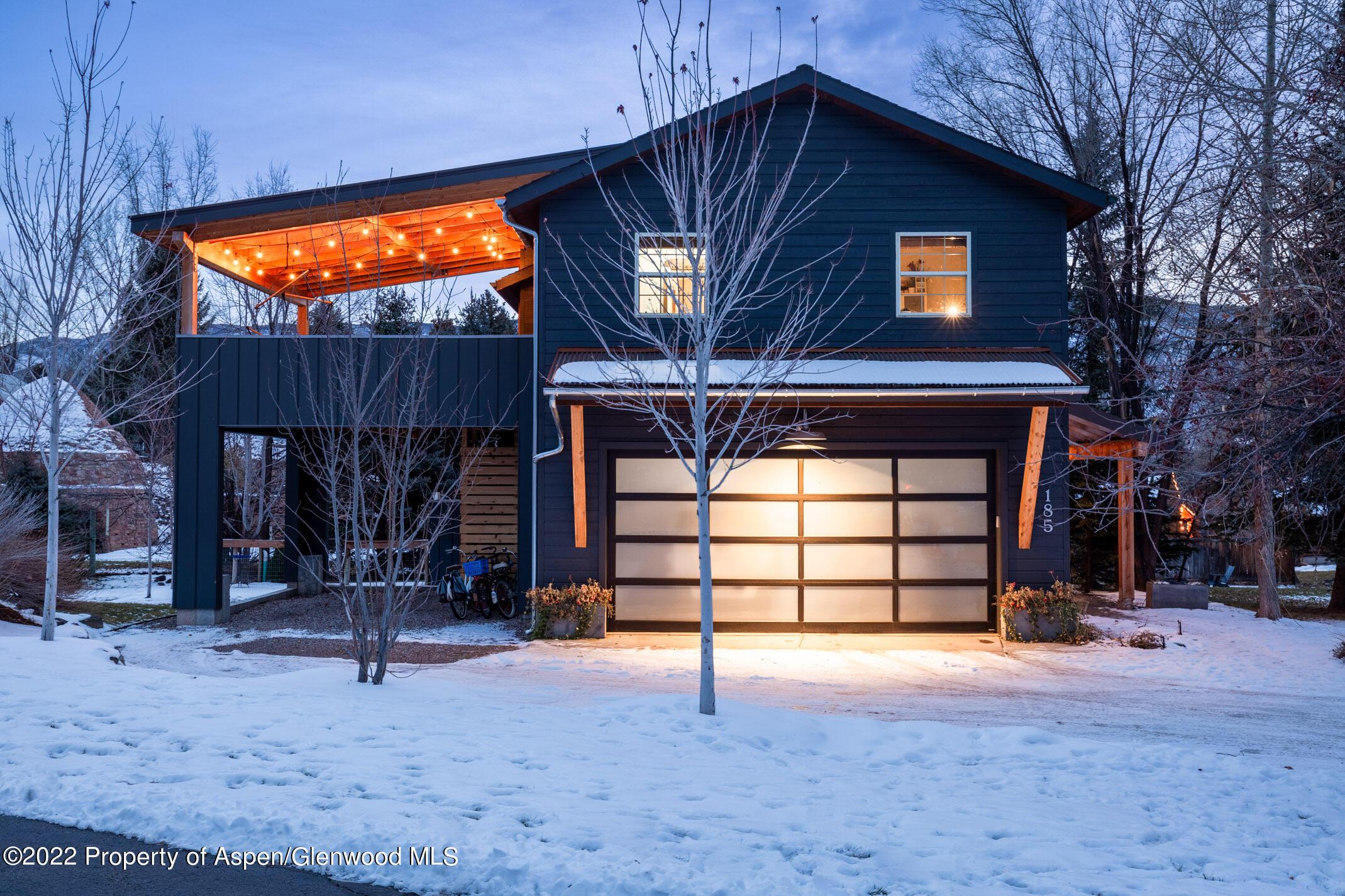 185 Riverside Drive Basalt, CO 81621 - Photo 1 of 22 a front view of a house with a yard