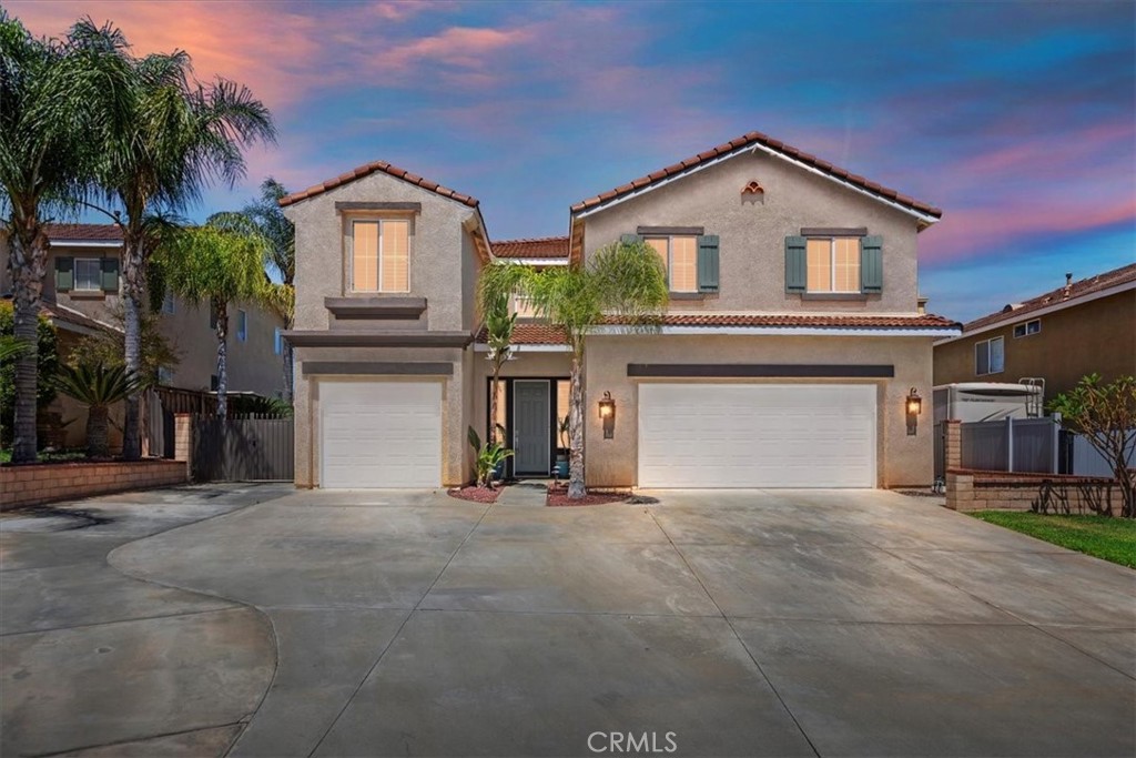 8433 Lindenhurst Street Riverside, CA 92508 - Photo 1 of 1 a view of a house with a yard and garage