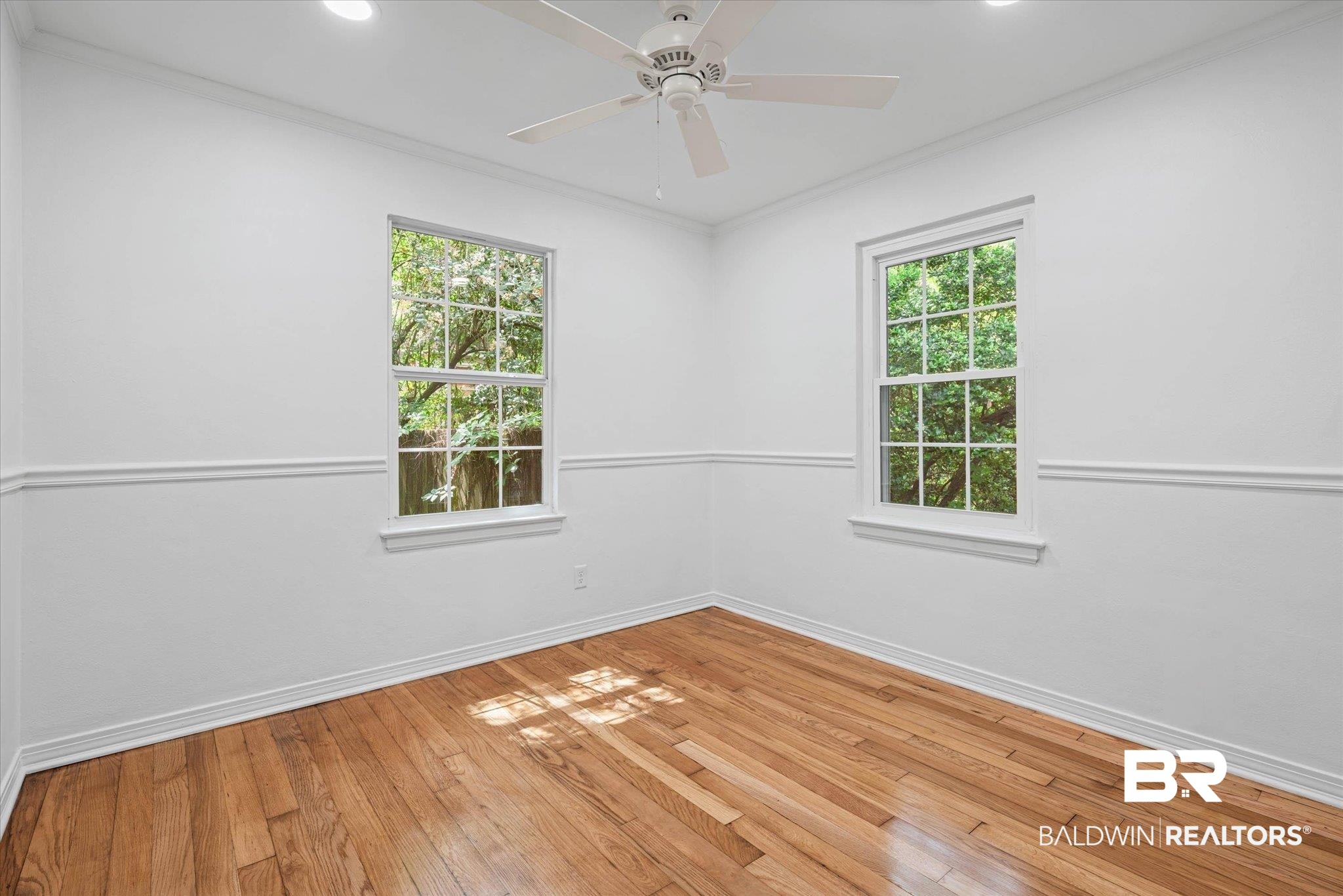 41 Hathaway Road West Mobile, AL 36608 - Photo 15 of 24 Spare room with ornamental molding, light wood finished floors, ceiling fan, and recessed lighting
