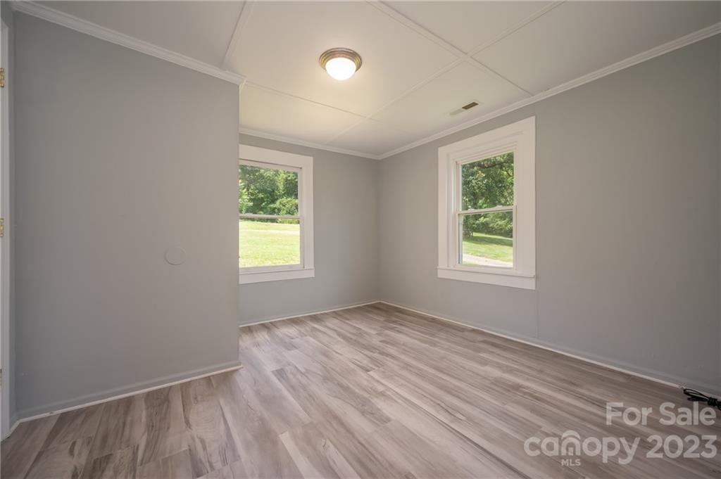 155 North Ridgecrest Avenue Rutherfordton, NC 28139 - Photo 14 of 18 an empty room with windows