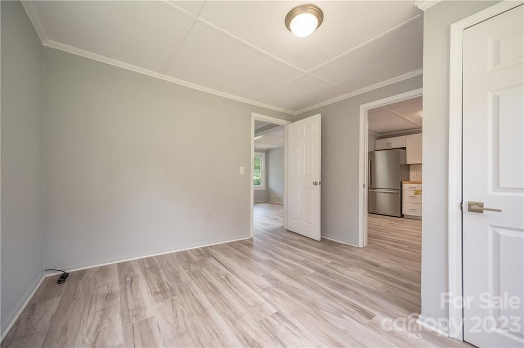 155 North Ridgecrest Avenue Rutherfordton, NC 28139 - Photo 15 of 18 wooden floor in an empty room