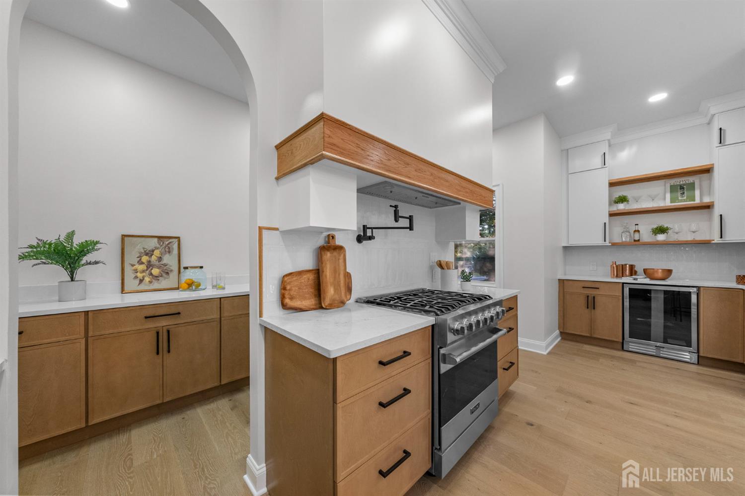 2 Beech Lane Edison, NJ 08820 - Photo 12 of 51 a kitchen with a stove and a sink