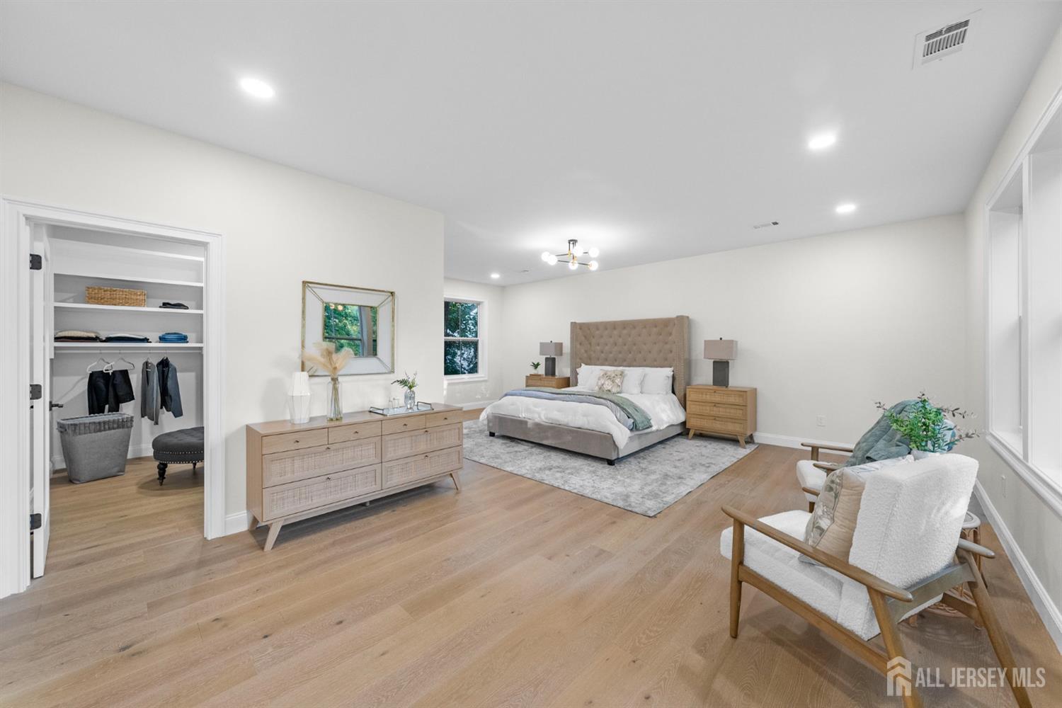 2 Beech Lane Edison, NJ 08820 - Photo 24 of 51 a living room with furniture and a wooden floor
