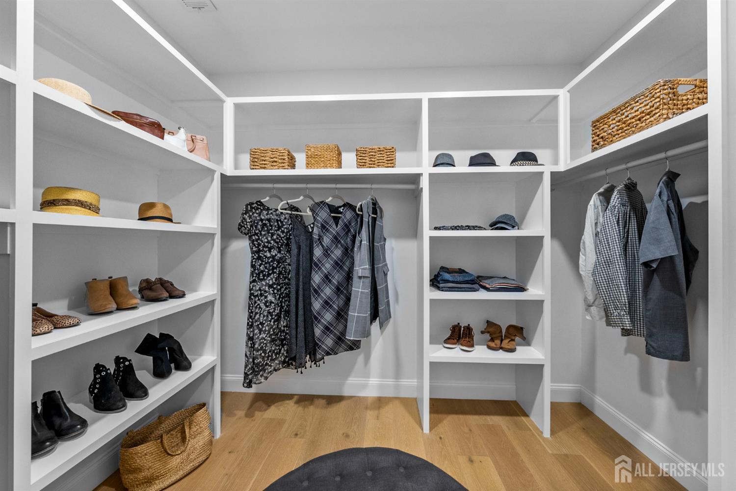 2 Beech Lane Edison, NJ 08820 - Photo 27 of 51 a view of walk in closet with clothes and shoes
